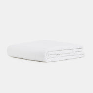 A neatly folded Linen Box Quilt is displayed on a plain white background.