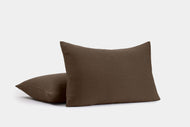 Two Ribbed Cotton Shams with a brown, textured finish are shown against a plain white background; one sham stands upright while the other lies flat in front.