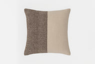 The Two-Tone Throw Pillow features a rectangular shape with a textured brown left half and textured beige right half, displayed against a plain white background.