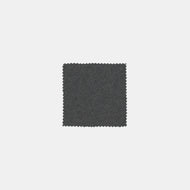 An Italian Wool Felt Swatch in dark gray with zigzag-cut edges is centered on a plain white background.