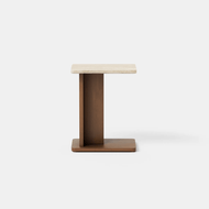The Beam Stone Side Table features a minimalist design with a light rectangular top, a vertical dark brown support, and a matching rectangular base, photographed against a plain white background.
