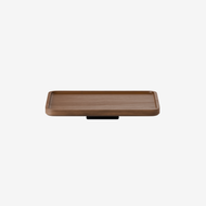 The Floating Side Table is a rectangular wooden tray with raised edges and rounded corners, shown on a flat surface against a plain white background.