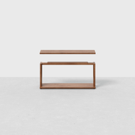 The Pillar Bookshelf Shelves features a modern wooden design with a rectangular top, open sides, and a lower shelf, displayed against a plain white background.