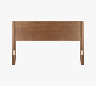 The Classic Headboard features a smooth, rectangular wooden design with a warm brown finish, shown against a plain white background.