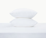 A Cotton Percale Sheet Set is displayed on a white surface against a plain white background.
